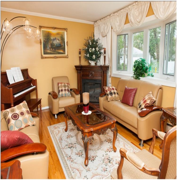 Warm and inviting living room at Gracious Family Type Home